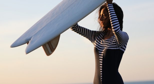 Tackle the ocean with femininity and style in surfsuits from Lore of the Sea