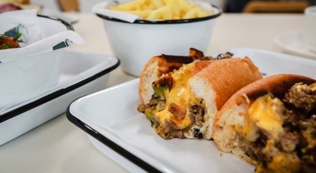 Wrap your mitts around a Philly cheesesteak sandwich from Junior&#8217;s Deli