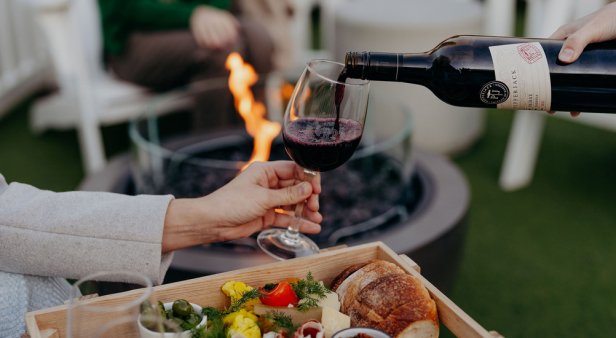 Get cosy with wine and charcuterie around a fire pit at Winter in the Garden