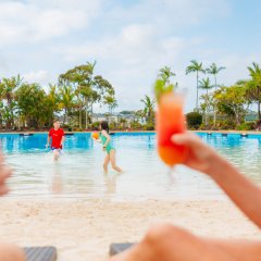 Live the resort life for a day with sips and snacks poolside at Lagoon Beach Club
