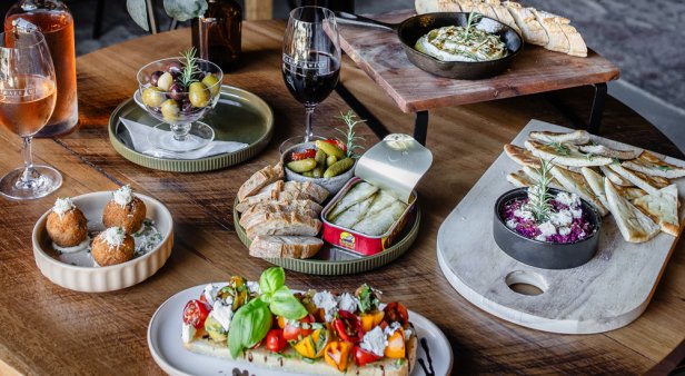 Embrace the temperature shift with shiraz and baked camembert by the fire pit at Carafe Wine