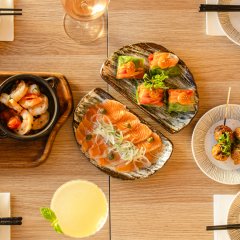 Snack on tsukune skewers, sizzling prawns and Japanese-curry arancini at Mermaid&#8217;s Blessing of the Sun